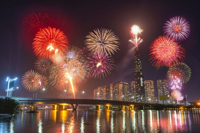 High resolution image of colorful fireworks of Ho Chi Minh City at new year 2020 view from Landmark 81 riverside.