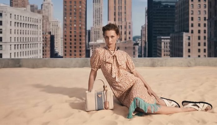 Bella Hadid Leads Prada's Urban Take On Summer Dressing For 2026
