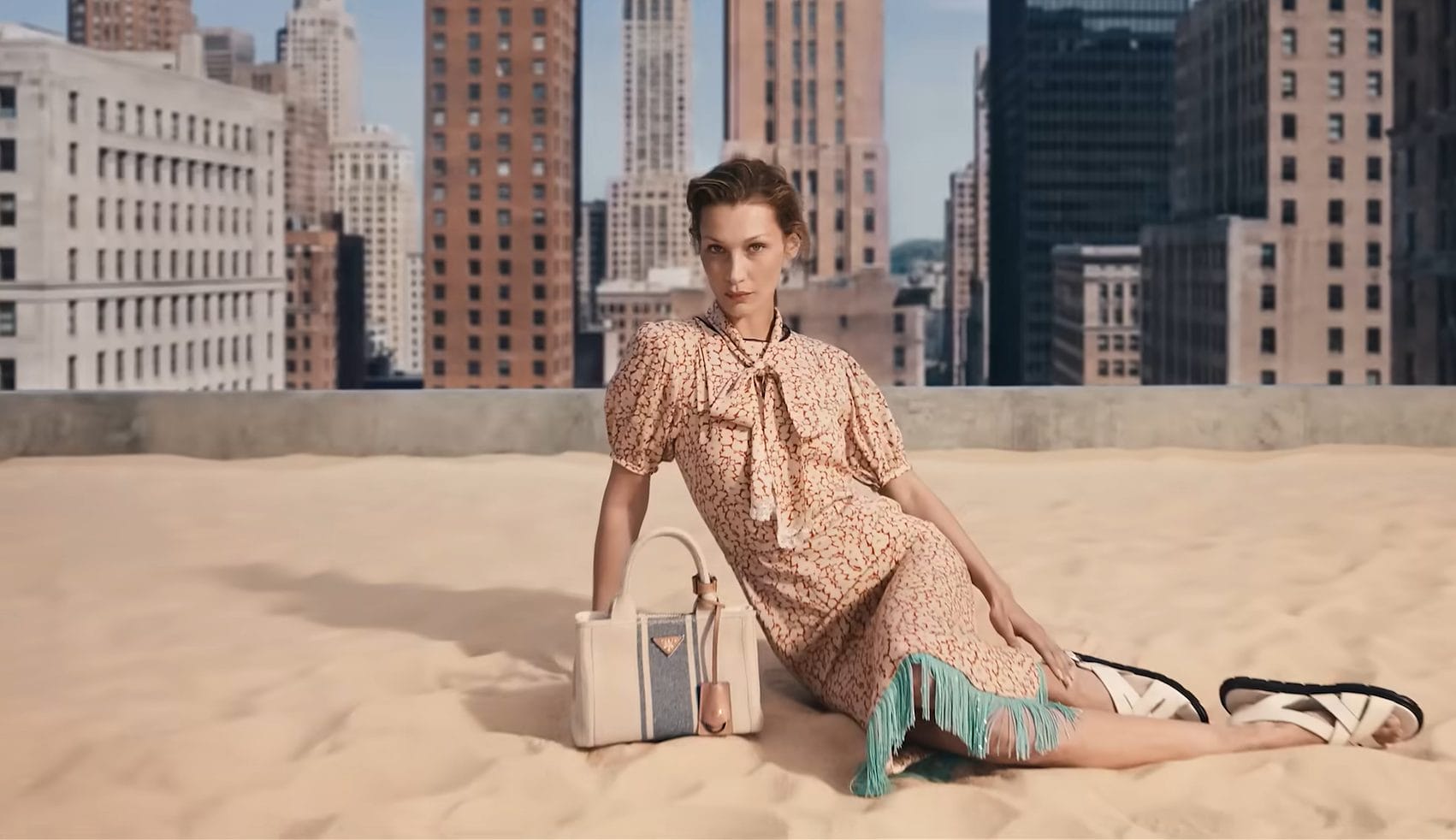 Bella Hadid Leads Prada's Urban Take On Summer Dressing For 2026